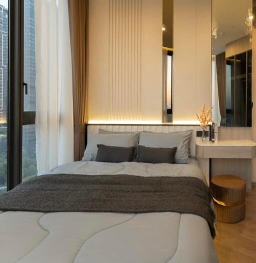 Modern bedroom with large bed and stylish decor