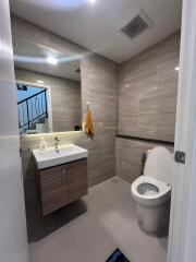 Modern bathroom with neutral color scheme and clean design