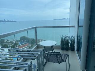 Balcony with ocean view and seating area