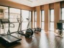 Home gym with modern equipment and large windows