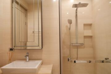 Modern bathroom with a walk-in shower and glass enclosure