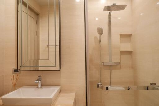 Modern bathroom with a walk-in shower and glass enclosure