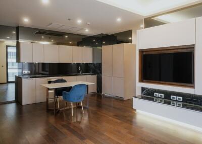 Modern kitchen with integrated appliances and breakfast bar