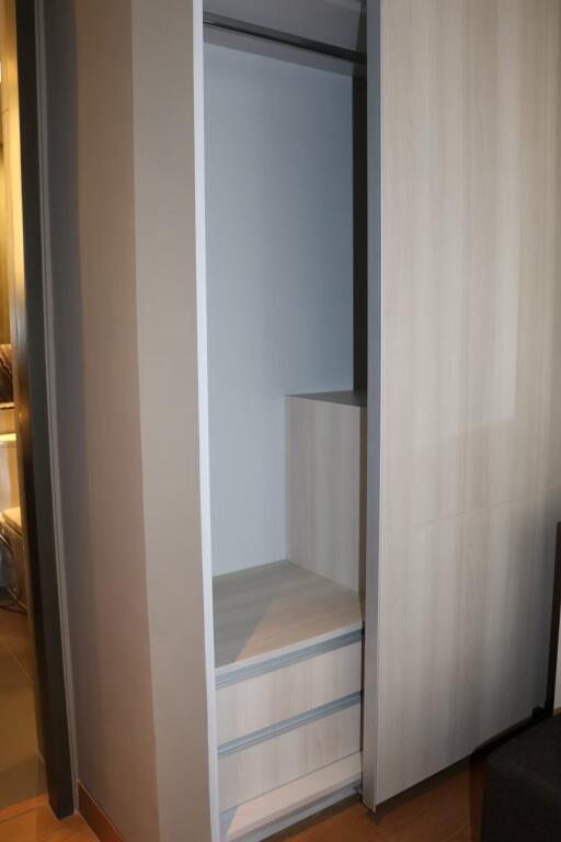 Modern built-in wardrobe with open sliding door