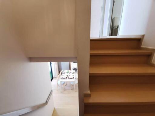 Interior view of a home with staircase leading down to dining area