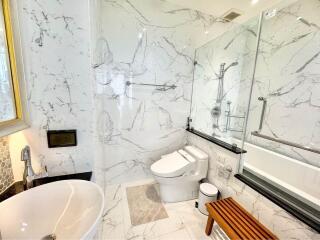 Modern bathroom with marble finishes and elegant fixtures