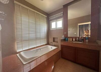 Spacious bathroom with modern fixtures and natural light