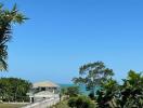 Seaside house view with clear blue sky