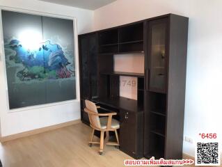 Modern bedroom with spacious dark wooden bookshelf and minimalist decor