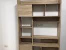 Wooden bookshelf in a modern living space