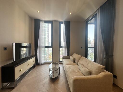 Modern living room with natural light and city view