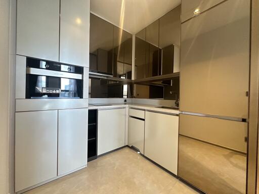 Modern kitchen with built-in appliances and ample storage