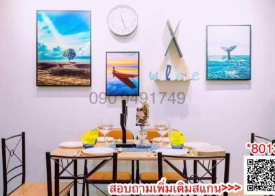 Elegantly set dining table in a modern dining room with wall art