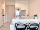 Modern kitchen with dining area in a new apartment