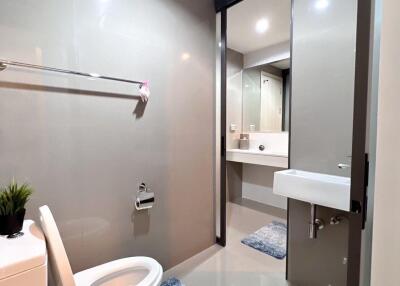 Modern bathroom with walk-in shower and vanity