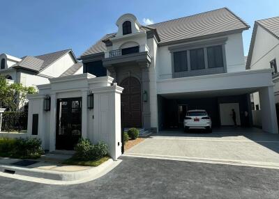 Elegant two-story house with spacious driveway and attached garage