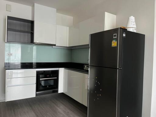 Modern kitchen with stainless steel appliances and abundant cabinet space