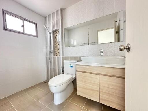 Modern bathroom with walk-in shower and vanity