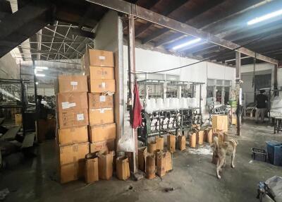 Industrial warehouse interior with boxes and equipment