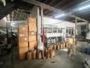 Industrial warehouse interior with boxes and equipment