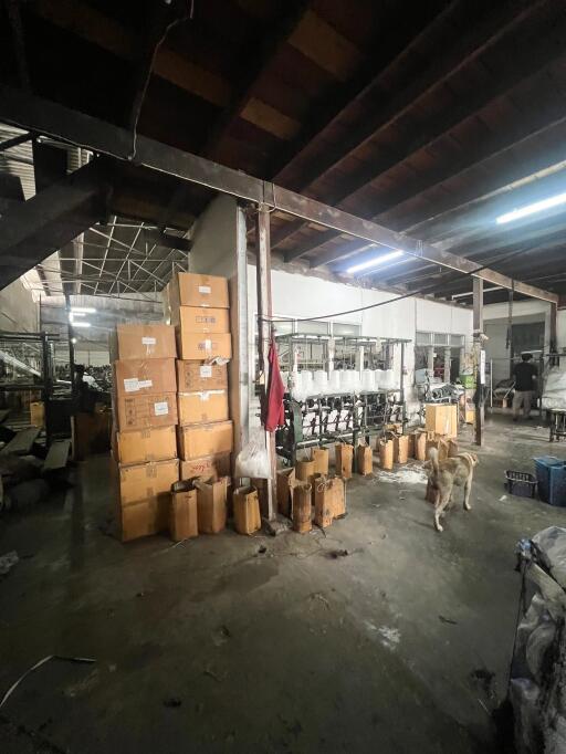 Industrial warehouse interior with boxes and equipment