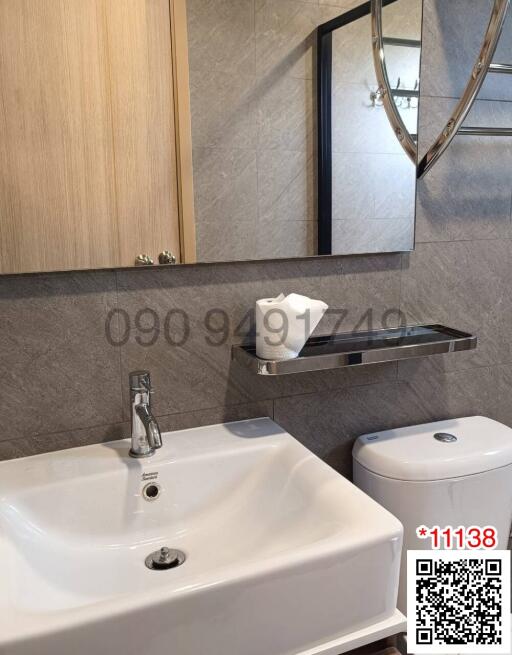 Modern bathroom with clean design and essential amenities