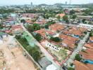 Aerial view of a residential plot for sale outlined in red