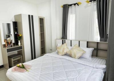 Modern bedroom interior with double bed and elegant decorations