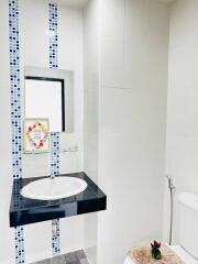 Modern bathroom with decorative mosaic tiles