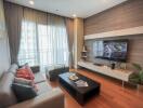 Modern living room with ample seating and a large television