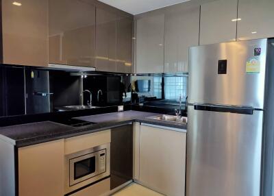 Modern kitchen with stainless steel appliances and ample cabinetry