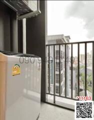 Compact balcony with city view and safety railing
