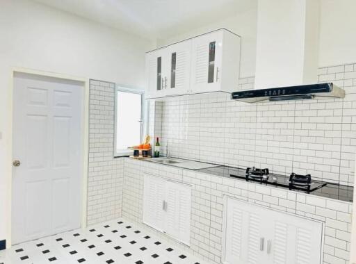 Bright and modern kitchen with clean tile design