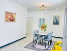 Bright and elegant dining room with a modern table set and vibrant floral decorations