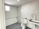 Modern bathroom with white tiles and stylish accents