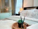 Cozy bedroom interior with a close-up of a bedside table featuring decorative elements