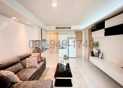 Spacious and modern living room with comfortable seating and elegant decor
