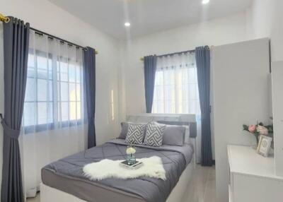 Modern bedroom with stylish furniture and elegant decor