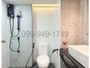 Modern white bathroom interior with shower and toilet