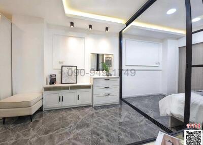 Modern bedroom with sleek design and built-in storage