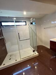 Modern bathroom with spacious glass shower enclosure and sleek design