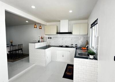 Modern kitchen with clean design and integrated appliances