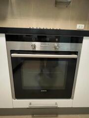 Modern built-in Siemens oven in a sleek kitchen setting