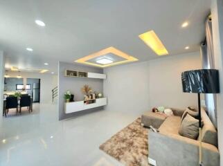 Modern and spacious living room with abundant lighting