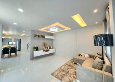 Modern and spacious living room with abundant lighting