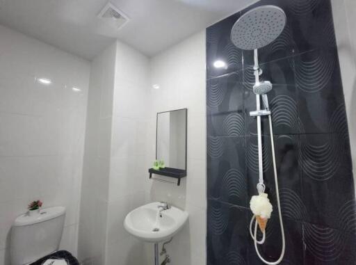 Modern bathroom interior with dark tiles