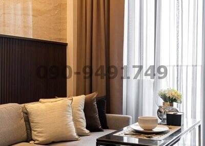 Modern living room interior with comfortable sofa and stylish coffee table