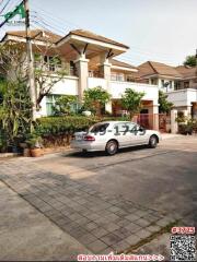 Exterior view of a residential home with car parked in front