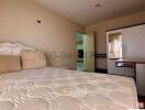 Cozy bedroom with en-suite bathroom and natural light