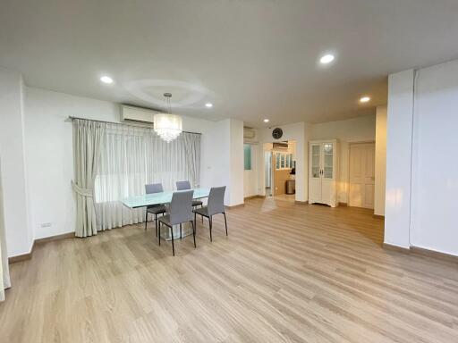 Spacious and modern living room with dining area